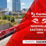 NERR passes a city with the text "R. J. Corman Railroad Company Nashville & Eastern Line (NERR) Wins Honorable Mention for 2026 Regional Railroad of the Year Awarded by: Railway Age