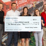 Enterprise Fleet Management visits R. J. Corman with $2,000 check